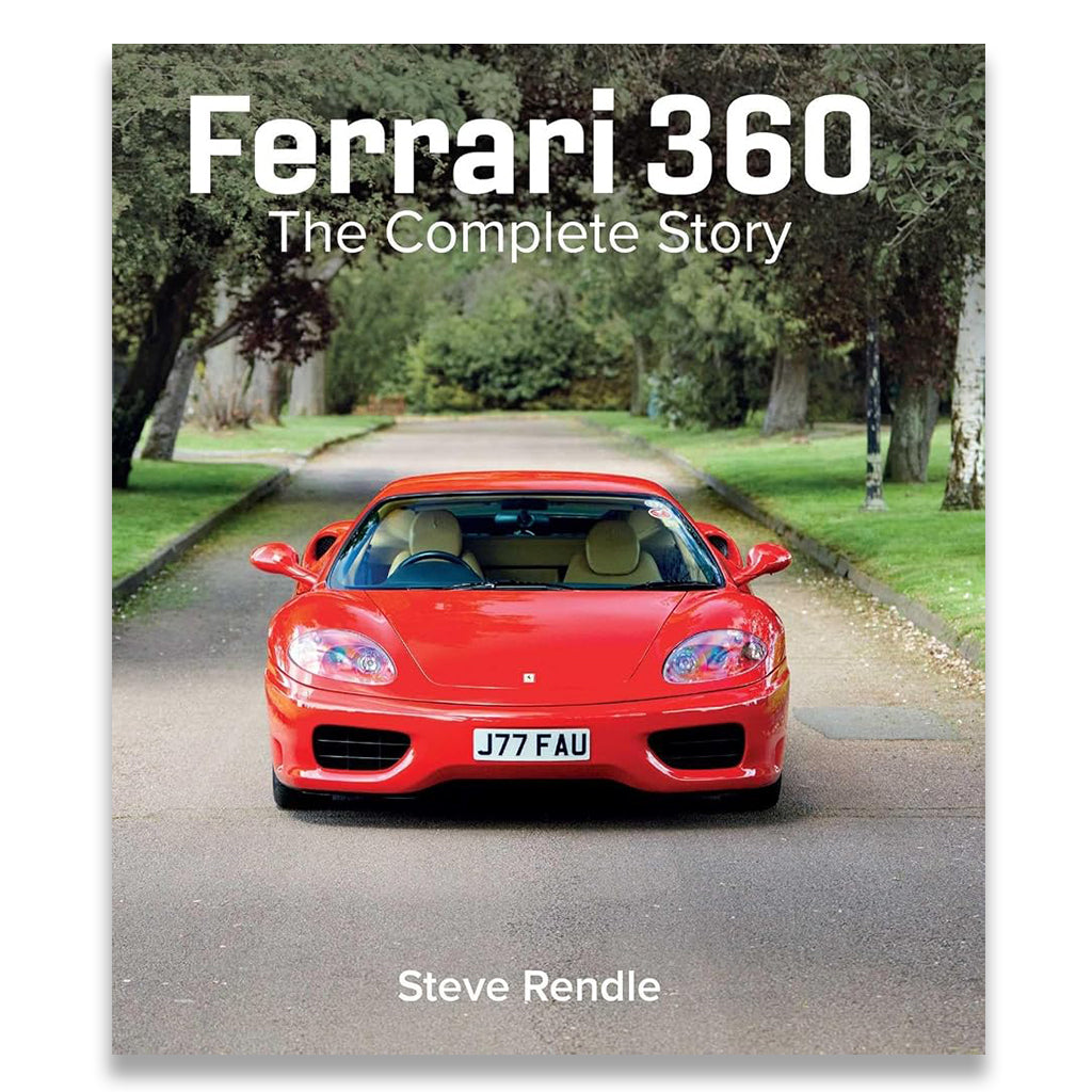 Red Ferrari 360 on a road with trees in the background