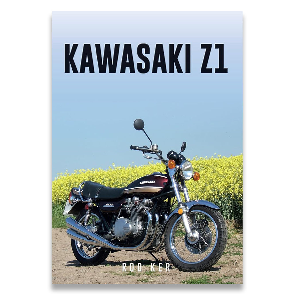Book cover of 'Kawasaki Z1' with a motorcycle on a dirt road and yellow flowers.