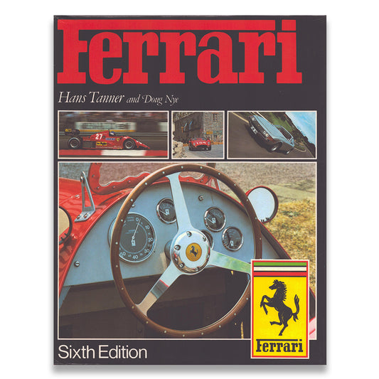 Ferrari book cover with steering wheel and logo on a white background