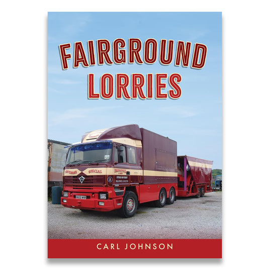 Book cover of 'Fairground Lorries' with a red truck on a clear day background