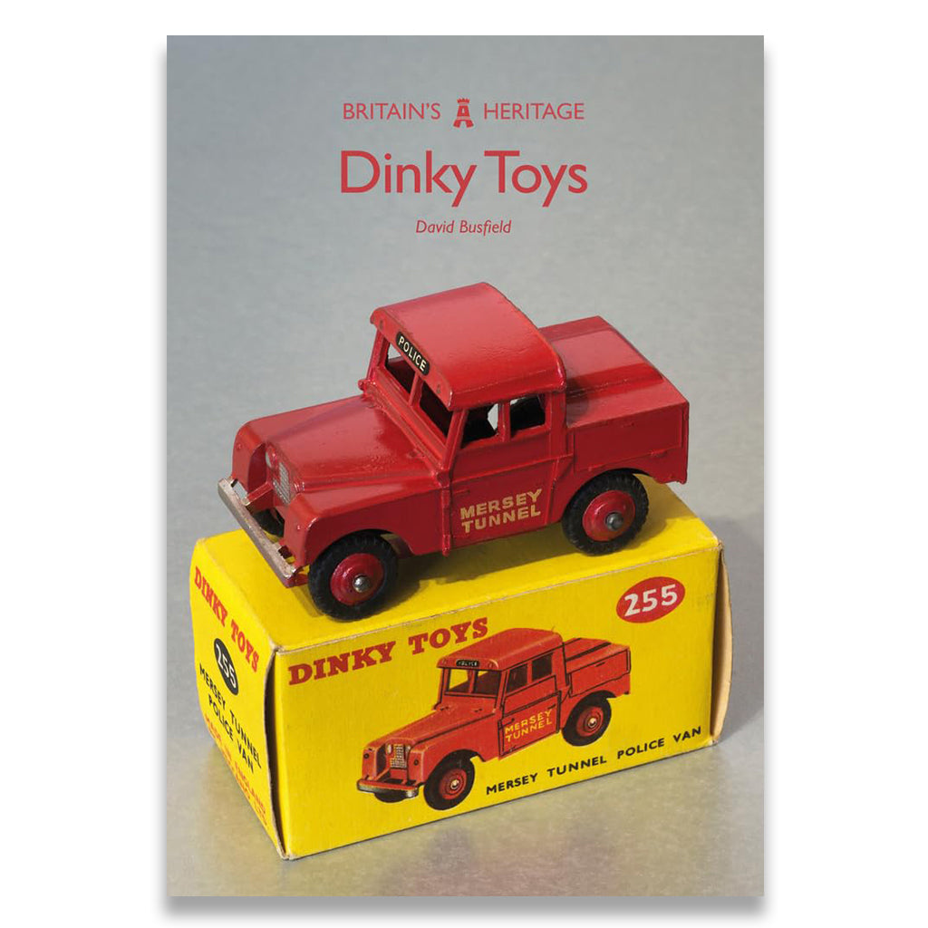 Book cover of 'Dinky Toys' featuring a red toy truck on a yellow box.