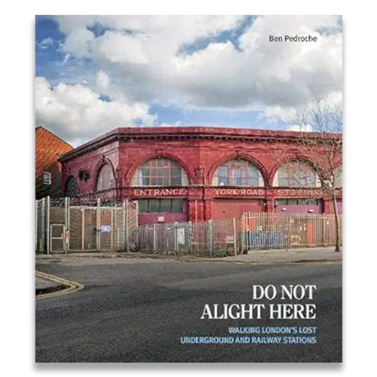 Book cover with a red brick building and 'Do Not Alight Here' text
