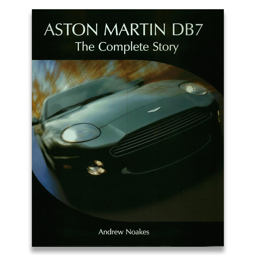 Book cover of 'Aston Martin DB7: The Complete Story' with a reflection of an Aston Martin car.